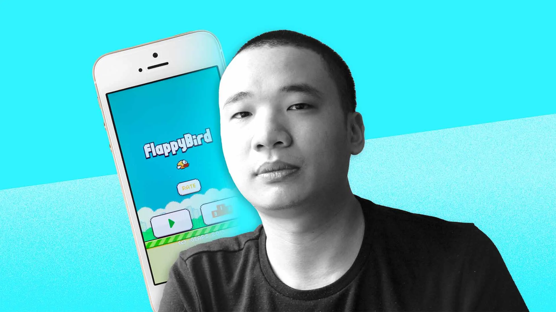 Dong Nguyen, creator of Flappy Bird, holding a device showing the game